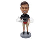 Custom Bobblehead Young priest in shorts reading the bible wearing a fanny pack on the waist - Leisure & Casual Casual Males Personalized Bobblehead & Action Figure