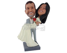 Custom Bobblehead Man Holding His Lovely Wife In His Hands Who Is Wearing A Gorgeous Strapless Gown - Wedding & Couples Couple Personalized Bobblehead & Cake Topper