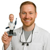 Custom Bobblehead Nice optometrist doctor with both hands inside lab coat with chair on the back and goggles around the neck - Careers & Professionals Optometrists Personalized Bobblehead & Action Figure