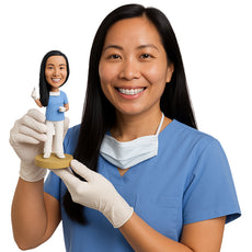 Custom Bobblehead Nice young dentist holding a pulling tool with a face mask on the neck - Careers & Professionals Dentists Personalized Bobblehead & Action Figure
