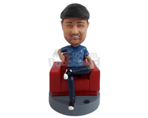 Custom Bobblehead Relaxed guy having a nice day sitting on the sofa with a pen holder on the base - Leisure & Casual Casual Males Personalized Bobblehead & Action Figure