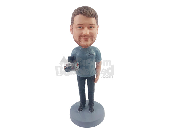 Custom Bobblehead Professional Cameraman holding a neat pro video cam wearing a t-shirt and nice shoes - Leisure & Casual Casual Males Personalized Bobblehead & Action Figure