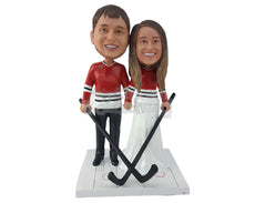 Custom Bobblehead Ice Hockey Couple With Their Sticks And Jersey'S Embedded To Their Fancy Gown And Suit - Wedding & Couples Couple Personalized Bobblehead & Cake Topper