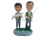 Custom Bobblehead Fishing Couple Showing Their Hobby. The Guy Is Holding A Hook And The Woman A Big Fish - Wedding & Couples Couple Personalized Bobblehead & Cake Topper