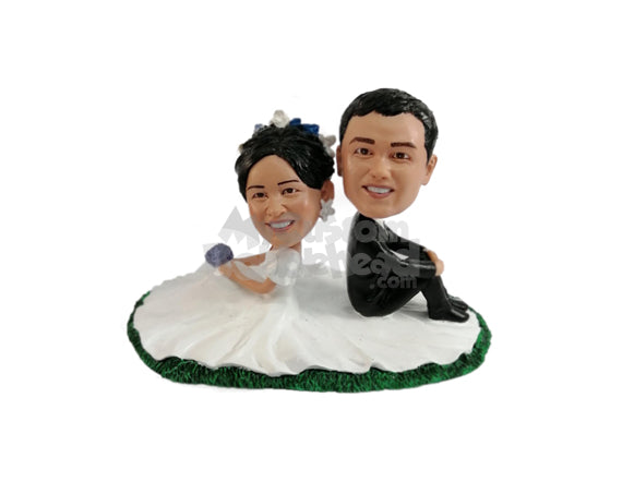 Custom Bobblehead Joyful married couple posing elegantly on the grass for their photobook session - Wedding & Couples Bride & Groom Personalized Bobblehead & Action Figure