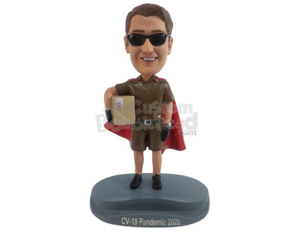 Custom Bobblehead Super Cool package carrier holdinf a package box and wearing a cape with a phone holder base - Careers & Professionals Corporate & Executives Personalized Bobblehead & Action Figure