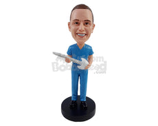 Custom Bobblehead Chiropractor In Scrubs Holding A Spine In Hand - Careers & Professionals Chiropractors Personalized Bobblehead & Cake Topper