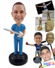Custom Bobblehead Chiropractor In Scrubs Holding A Spine In Hand - Careers & Professionals Chiropractors Personalized Bobblehead & Cake Topper