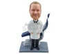 Custom Bobblehead Nice optometrist doctor with both hands inside lab coat with chair on the back and goggles around the neck - Careers & Professionals Optometrists Personalized Bobblehead & Action Figure