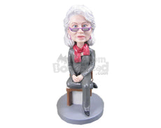 Custom Bobblehead Stylish Corporate Lady Sitting On A Chair Wearing Corporate Jacket, Pants With A Scarf Around Her Neck - Careers & Professionals Corporate & Executives Personalized Bobblehead & Cake Topper