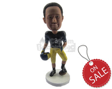 Custom Bobblehead Strong Football Player Giving A Pose With The Ball Under His Feet In Helmet In Hand - Sports & Hobbies Football Personalized Bobblehead & Cake Topper