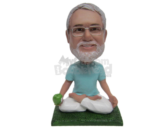 Custom Bobblehead Male Yoga Fan In Relaxing Pose And With Apple In Hand - Sports & Hobbies Yoga & Relaxation Personalized Bobblehead & Cake Topper