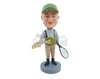 Custom Bobblehead Old fisherman guy holding a fish in one hand and a tennis racket on the other - Sports & Hobbies Fishing Personalized Bobblehead & Action Figure